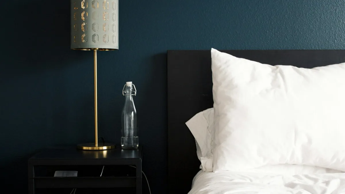 A calm bedroom with bedside furniture